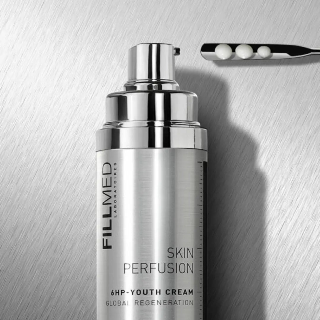 Fillmed Skin Perfusion 6HP Youth Cream 50ml bottle on metallic background, hydrating cream for combination skin with Vitamin B6.