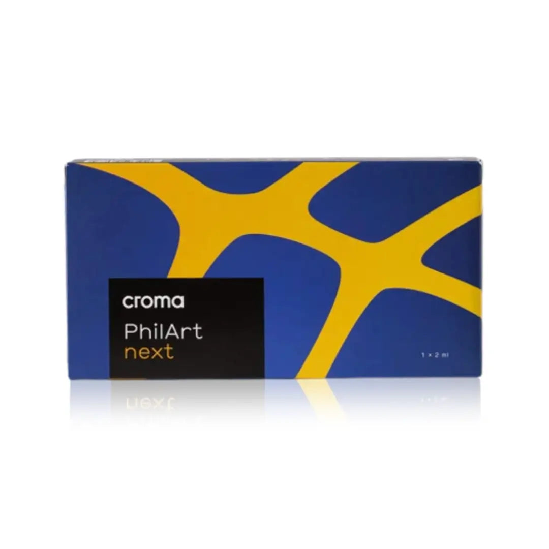 Box of Croma PhilArt Next with 1 x 2ml vial, featuring a blue and yellow design for skin rejuvenation treatment.