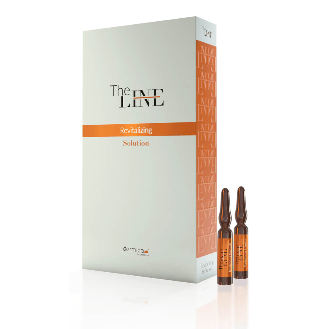 White packaging of Dermica Revitalizing Solution with orange detailing, features ten 2ml ampoules displayed in front, emphasizing the 'Revitalizing Solution' label.