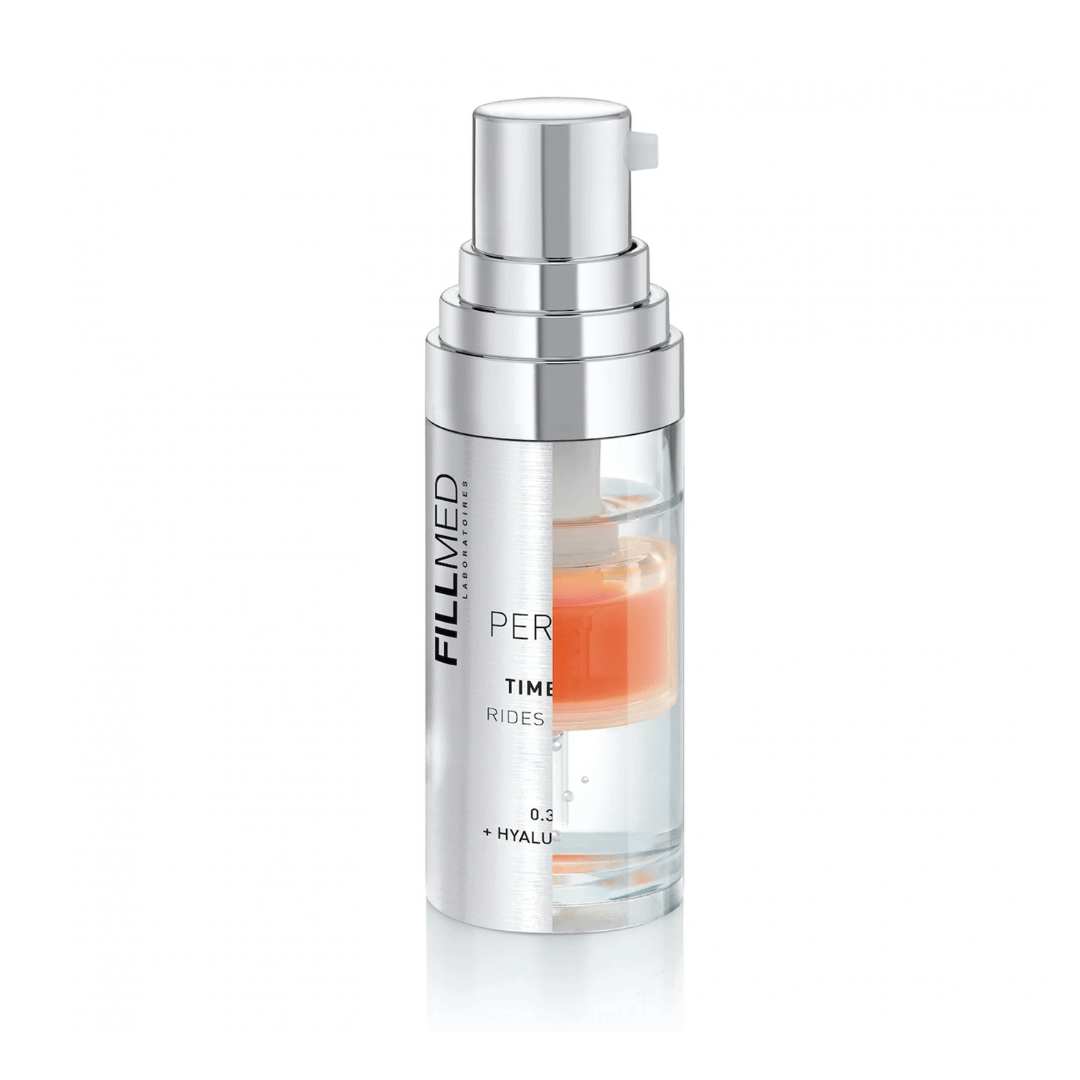 Transparent bottle with silver cap showing FILLMED Skin Perfusion Time Booster serum, 10ml, with visible orange-colored serum, for evening skin hydration and texture enhancement.