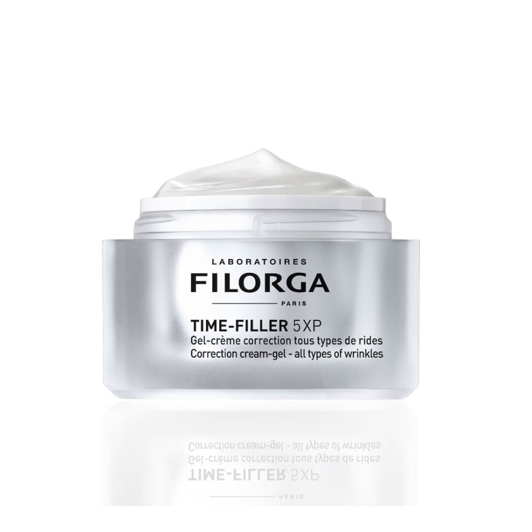 Open container of Filorga Time-Filler 5XP Cream showing its texture, ideal for reducing wrinkles and enhancing skin texture.