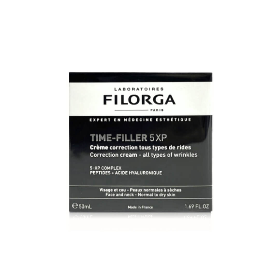 Filorga Time-Filler 5XP Cream in black packaging for normal to dry skin, emphasizing comprehensive wrinkle correction and skin rejuvenation.