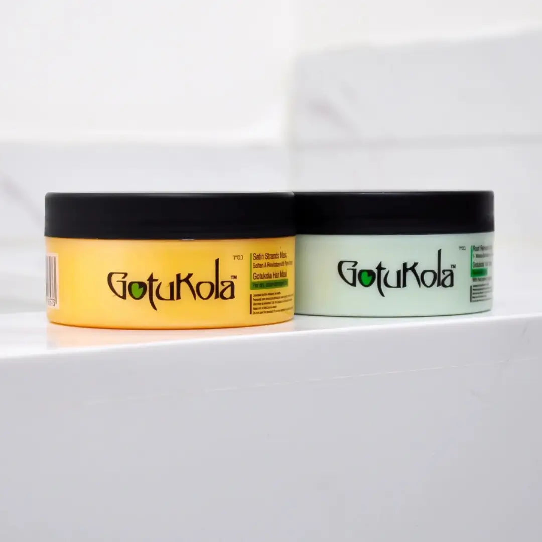 Pair of Gotukaola Keratin Hair Mask jars, yellow for intense hair nourishment and green for root healing, displayed on a clean background.