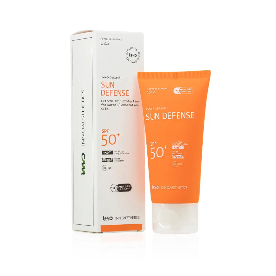 Innoaesthetics INNO-DERMA Sun Defense SPF50+ 60G tube and box, broad-spectrum sunscreen for UVB and UVA protection, suitable for all skin types, orange packaging.