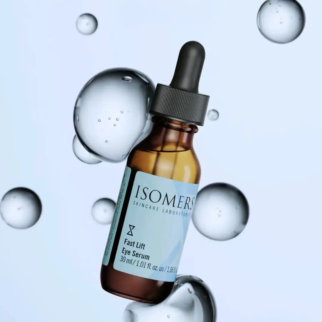 Isomers Skincare Fast Lift Eye Serum 30ML bottle, designed to reduce wrinkles and dark circles, with floating water bubbles in the background.