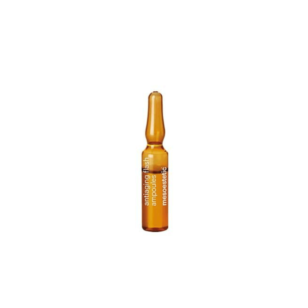 Single Mesoestetic anti-aging ampoule on a clear background, reduces wrinkles and fatigue.