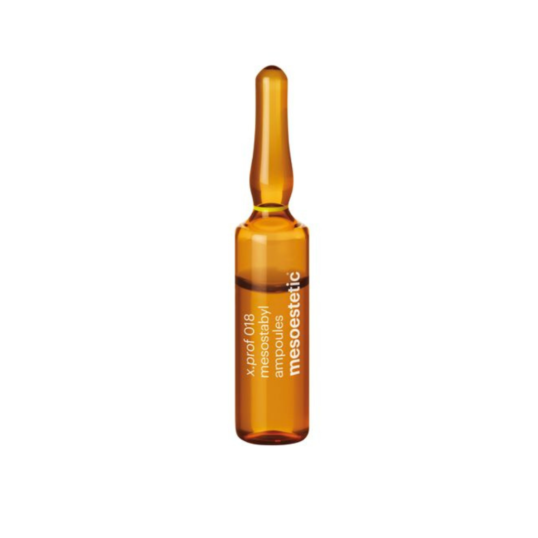 a close-up of a single 5ml ampoule of Mesoestetic X.Prof 018 Mesostabyl, used for revitalizing and toning localized areas.