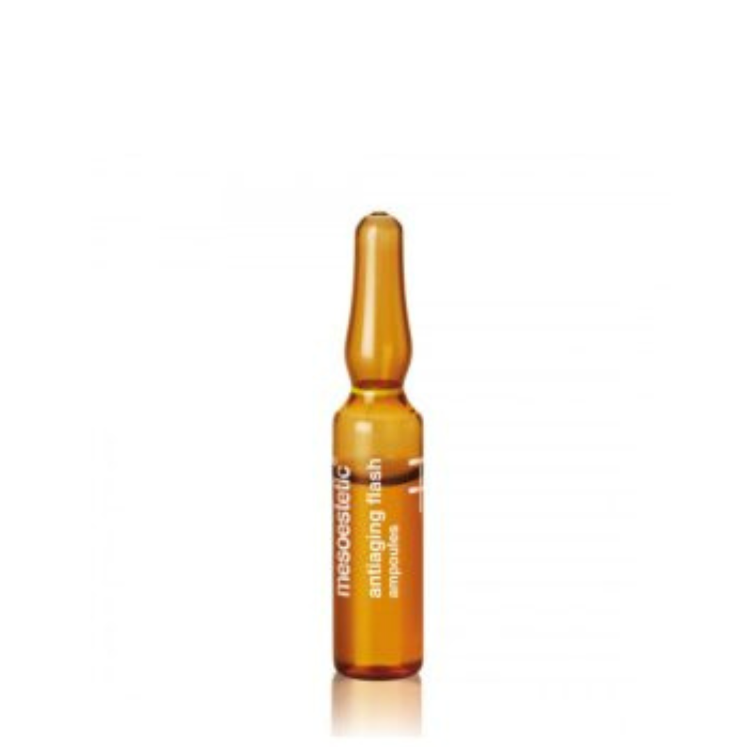 a close-up of a single 5ml ampoule of Mesoestetic X.Prof 020 20% Vitamin C, used for antioxidant and firming.