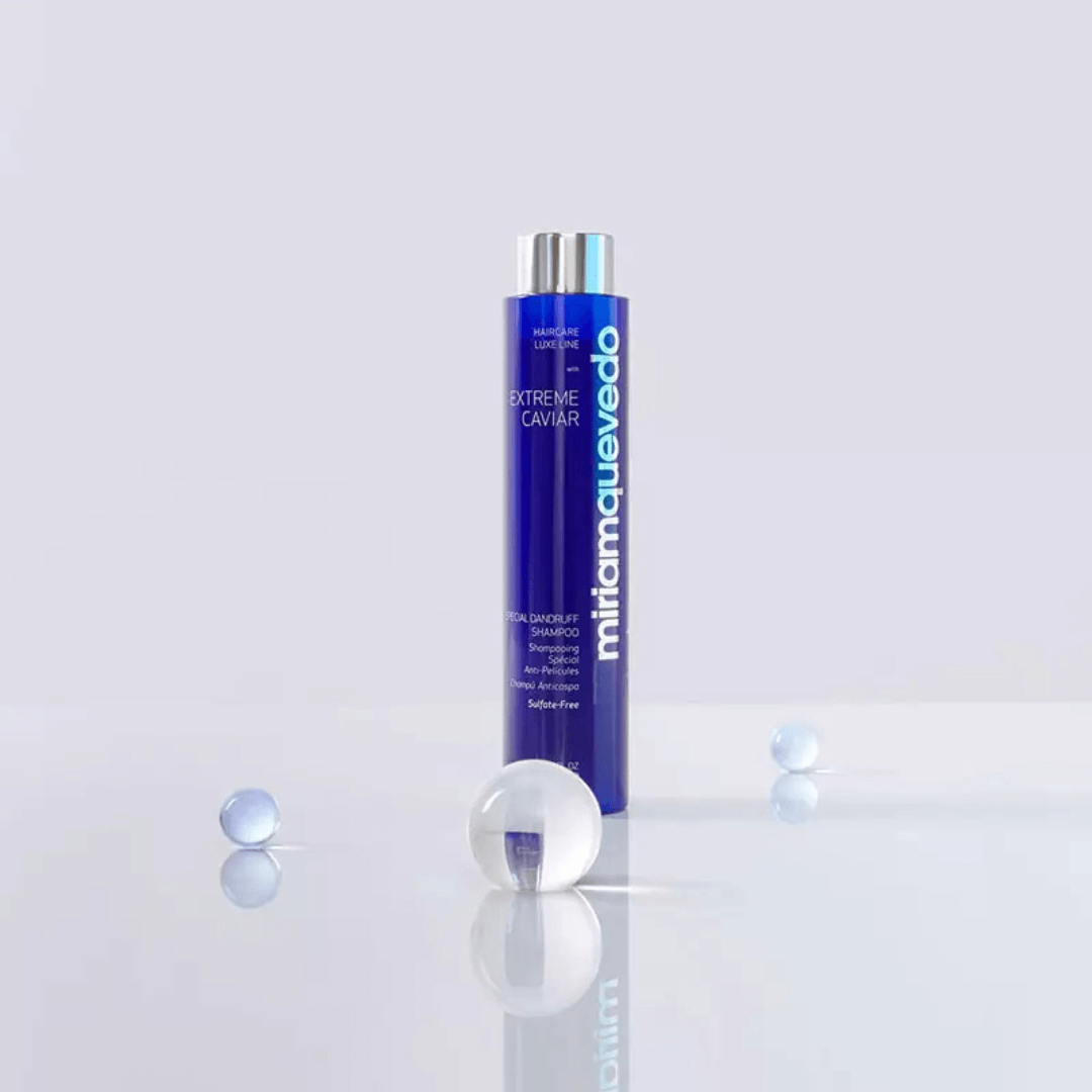 MiriamQuevedo Extreme Caviar Special Dandruff Shampoo 250ml, deep blue bottle with silver cap, surrounded by blue spheres, luxurious anti-dandruff treatment.