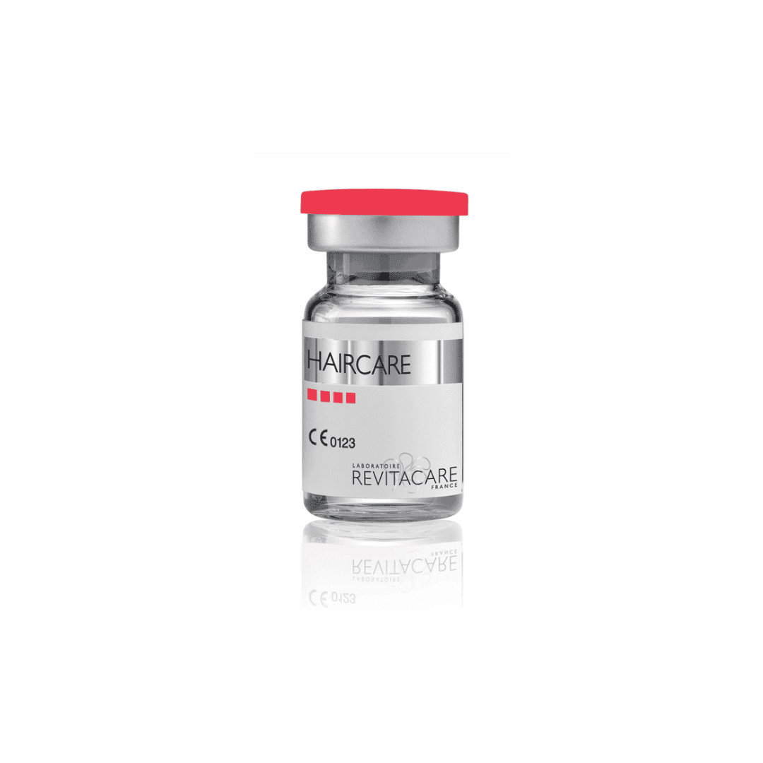 Single vial of Revitacare Haircare with a red cap, for improving hair and scalp quality.