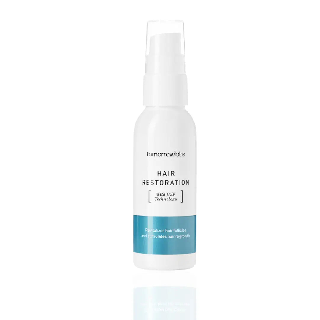 50ml bottle of Tomorrowlabs Hair Restoration Liquid, a lightweight formula to revitalize hair follicles and stimulate hair regrowth.