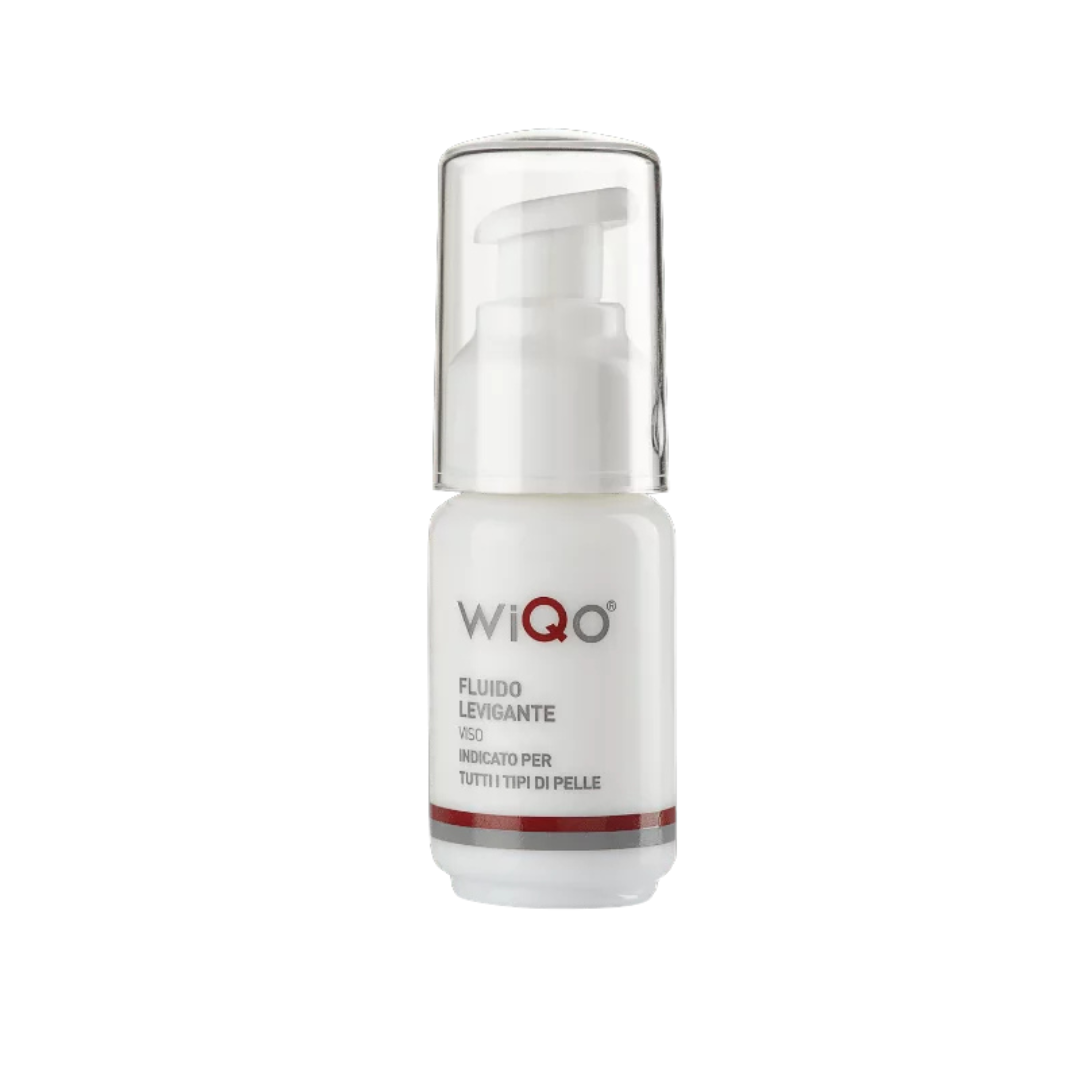 WiQo Facial Smoothing Fluid in a 30ml white bottle with a clear pump cap, designed to hydrate and improve skin appearance for all skin types.